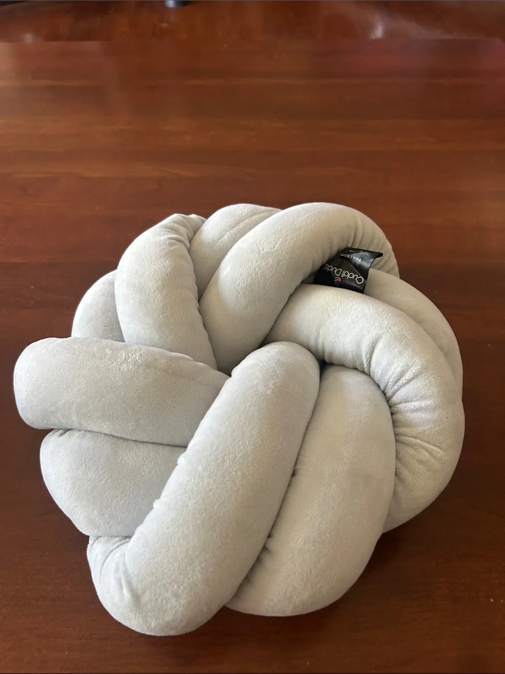 Cuddle Duds 14” Plush Knot Throw Pillow in Light Gray